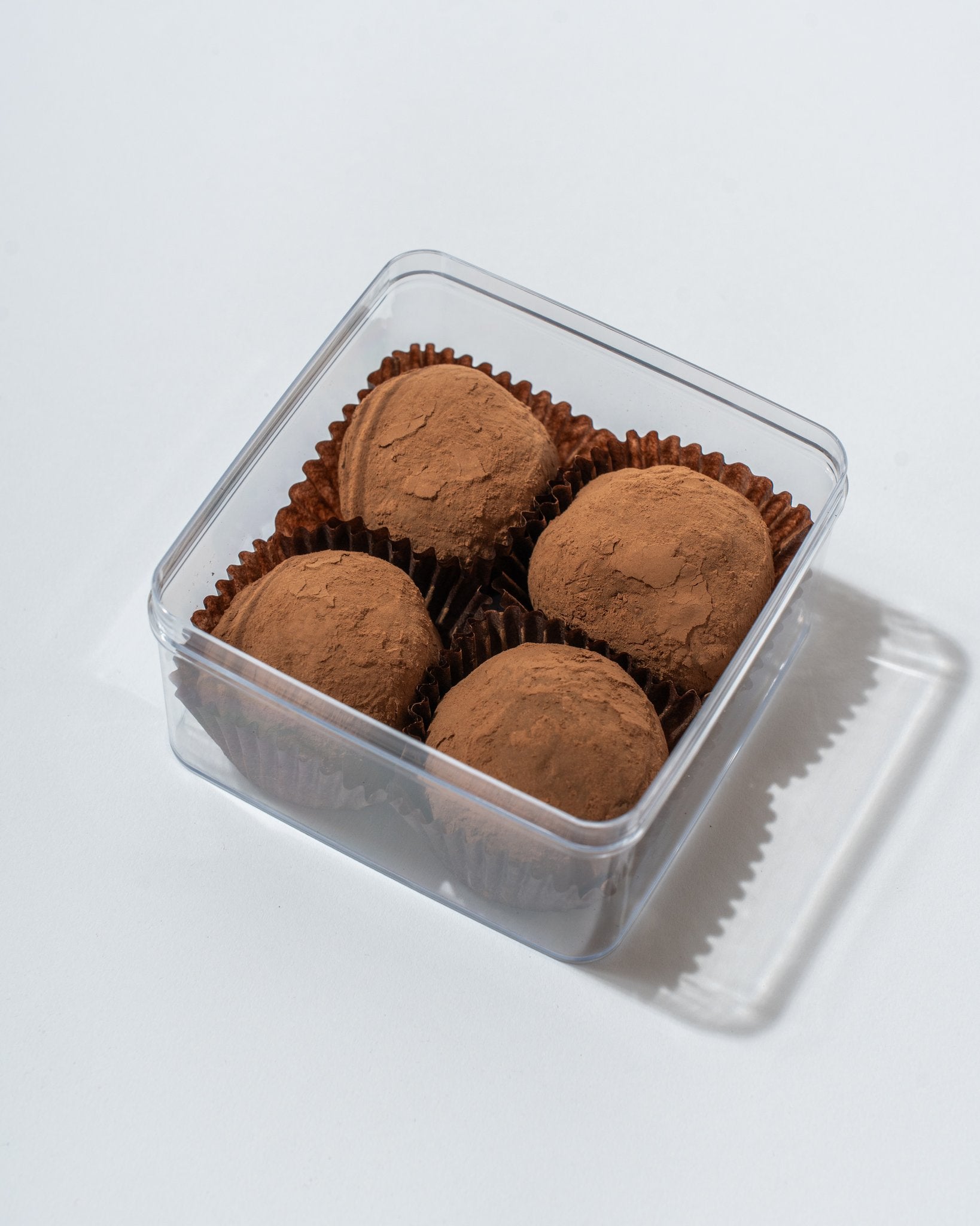 Box of 4 Dubai truffles in clear packaging