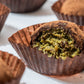 Close-up of broken truffle with pistachio filling